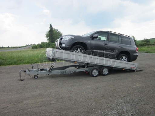 Dvouosý brzděný přívěs s hydraulicky sklopnou plochou AD speciál valník 2,7t  4,15/1,88/0,35** č.198