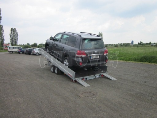 Dvouosý brzděný přívěs s hydraulicky sklopnou plochou AD speciál valník 2,7t  4,15/1,88/0,35** č.201